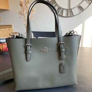Coach Mollie tote. New w/o tags. Army green with deep purple inside.